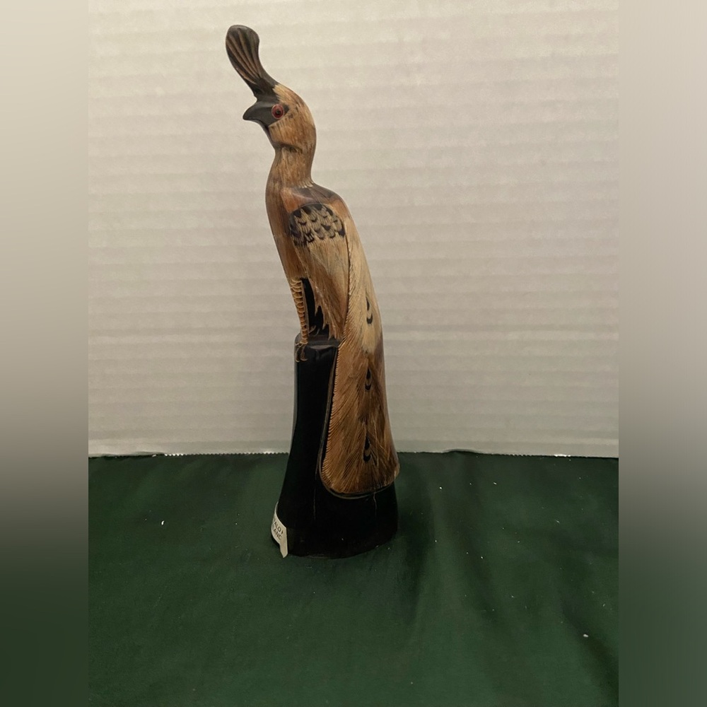 Hand carved bird from Buffalo horn. Beautiful piece very detailed.